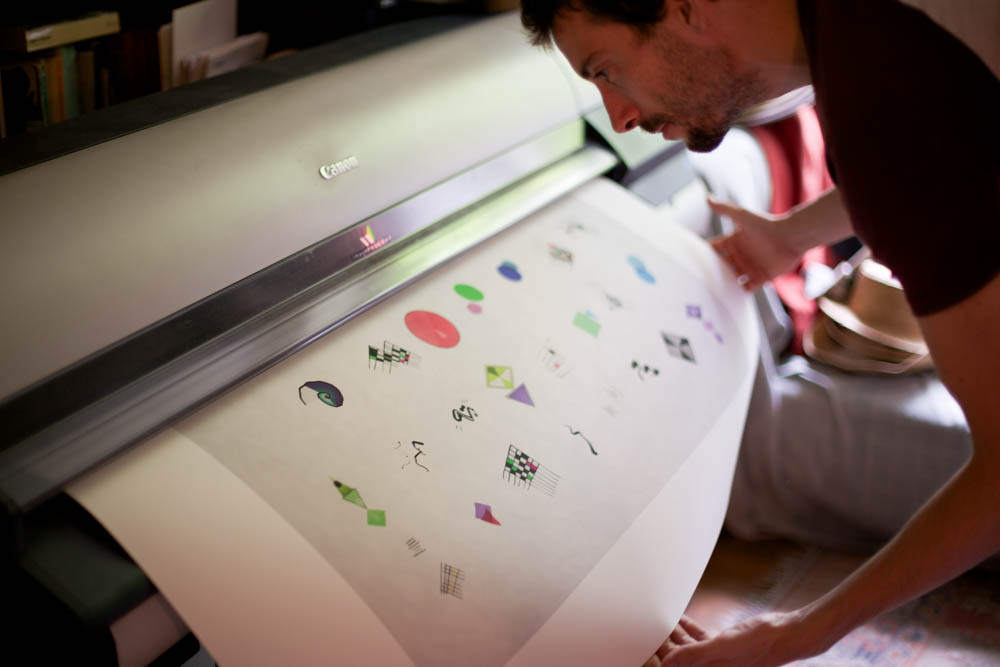 Inspecting the first ever DNArtwork print.